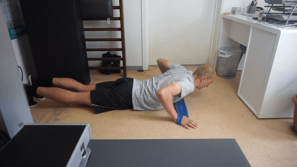 How to do a resistance band pushup
